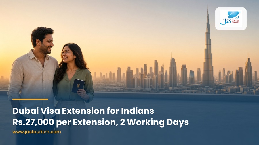 Indian couple holding a passport on a Dubai rooftop, Dubai visa extension for Indians, JAS Tours and Travels